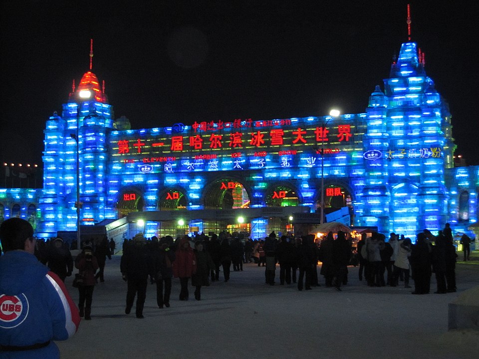 An illuminated building made of ice blocks